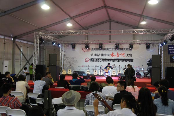 明和光电浓情助阵PALM EXPO第一届吉他中国木吉他大赛